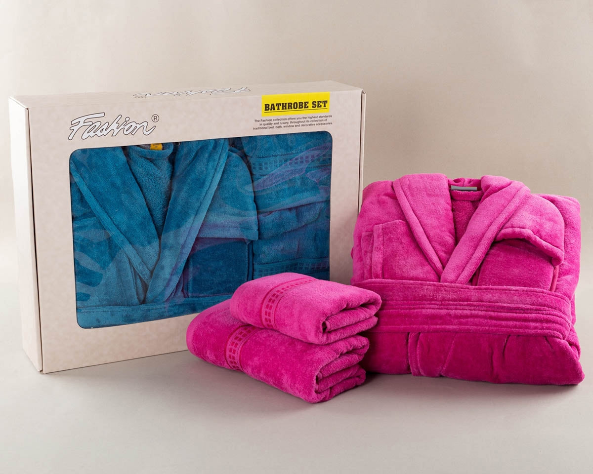 Pink and blue bathrobes with towels in box