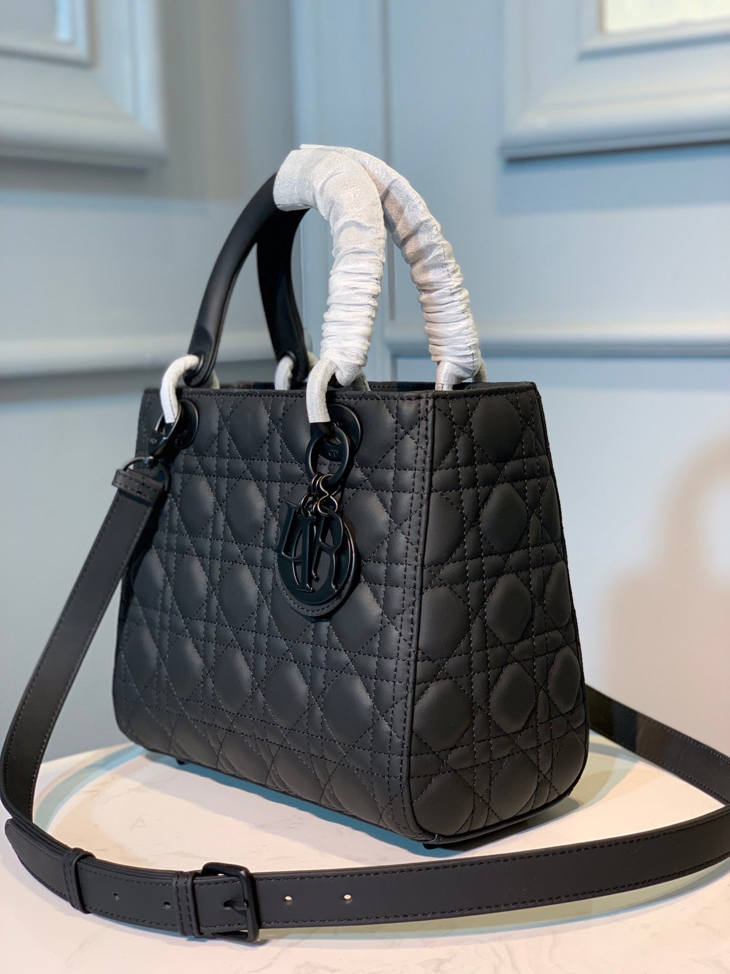 medium lady 24 black calfskin black hardware
