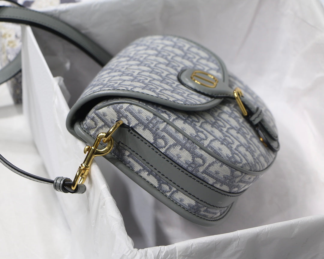 MEDIUM CD BOBBY 22CM GREY OBLIQUE CANVAS GOLD HARDWARE