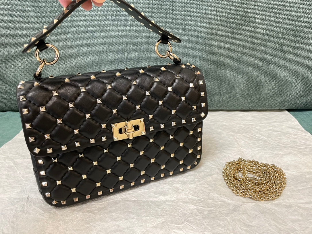 garavani rockstud spike medium 24cm black lambskin gold hardware