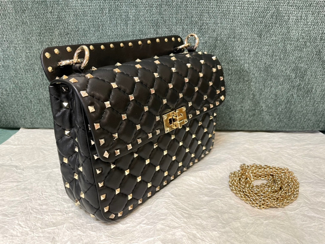 garavani rockstud spike medium 24cm black lambskin gold hardware