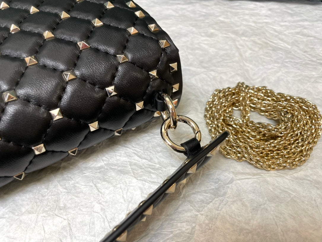 garavani rockstud spike medium 24cm black lambskin gold hardware