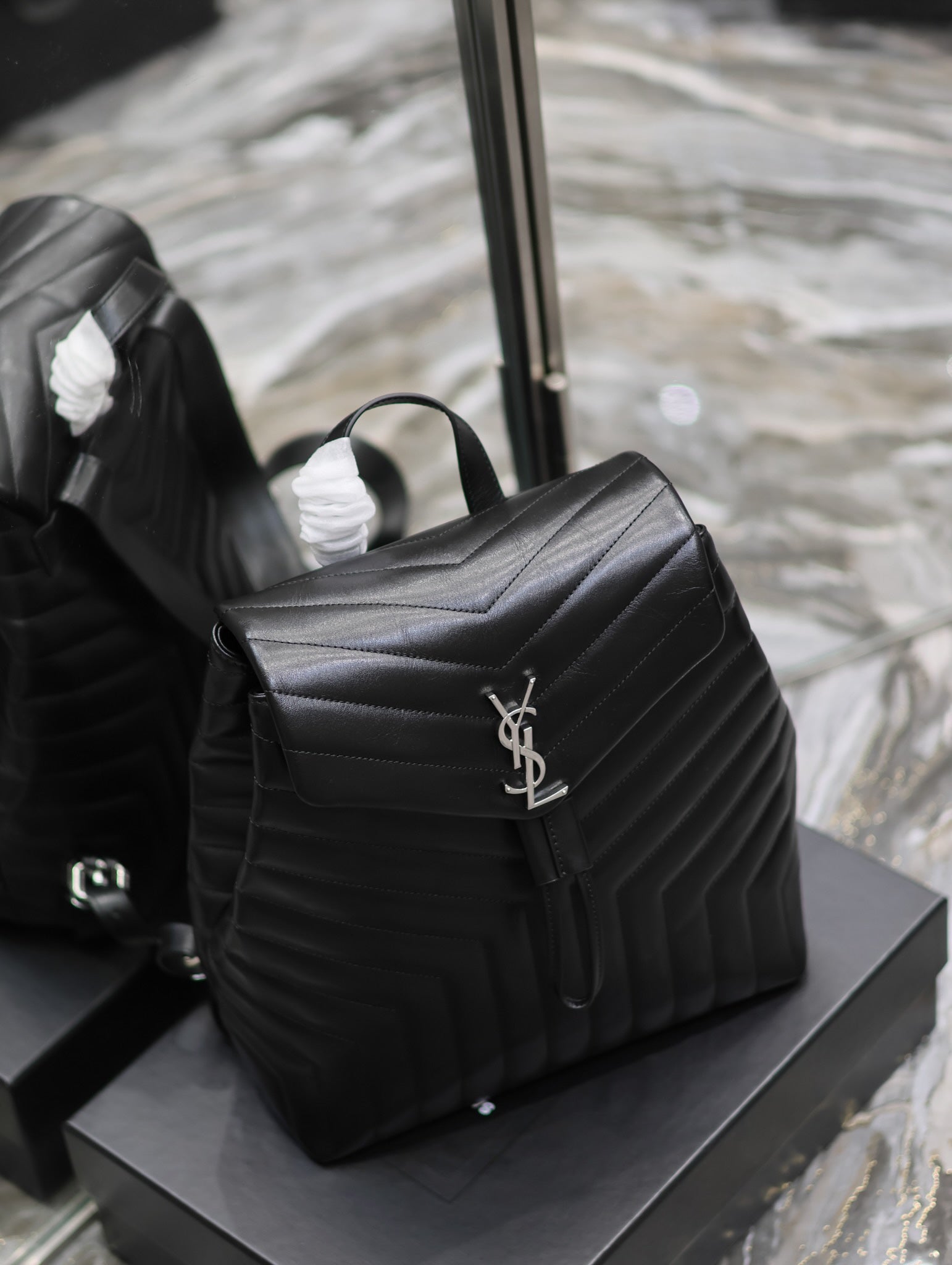 LOU BACKPACK 33 IN BLACK QUILTED CALFSKIN SILVER HARDWARE