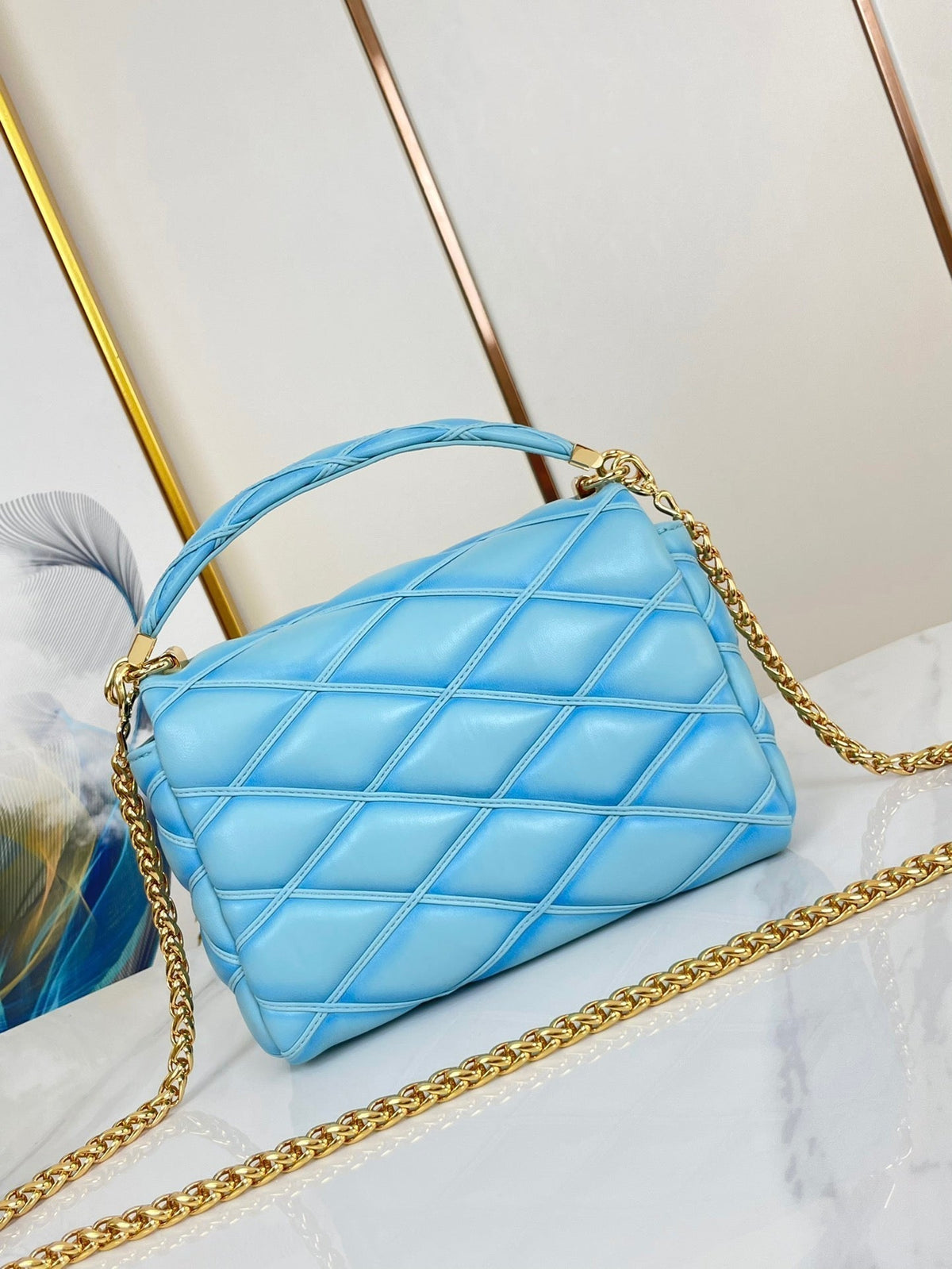 GO-14 MM 23 IN SKY BLUE QUILTED LAMBSKIN GOLD HARDWARE