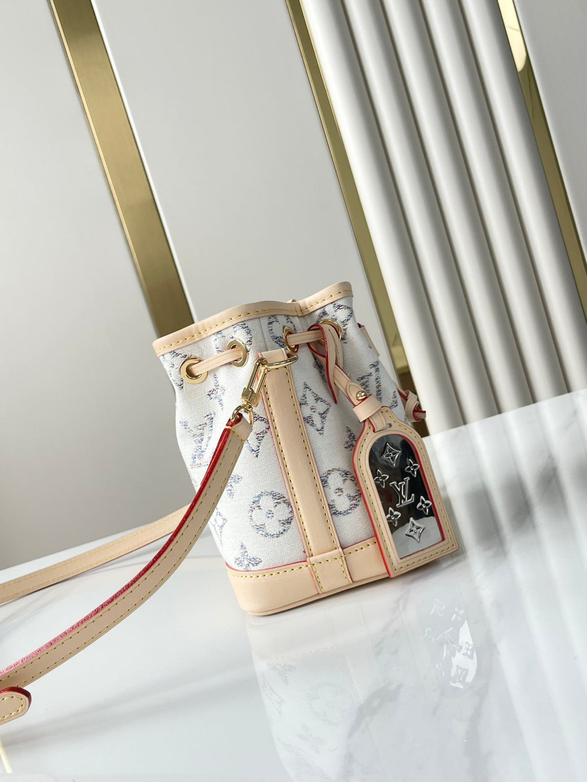 NANO NOÉ 16 IN WHITE MONOGRAM JACQUARD FABRIC AND BEIGE CALFSKIN TRIM