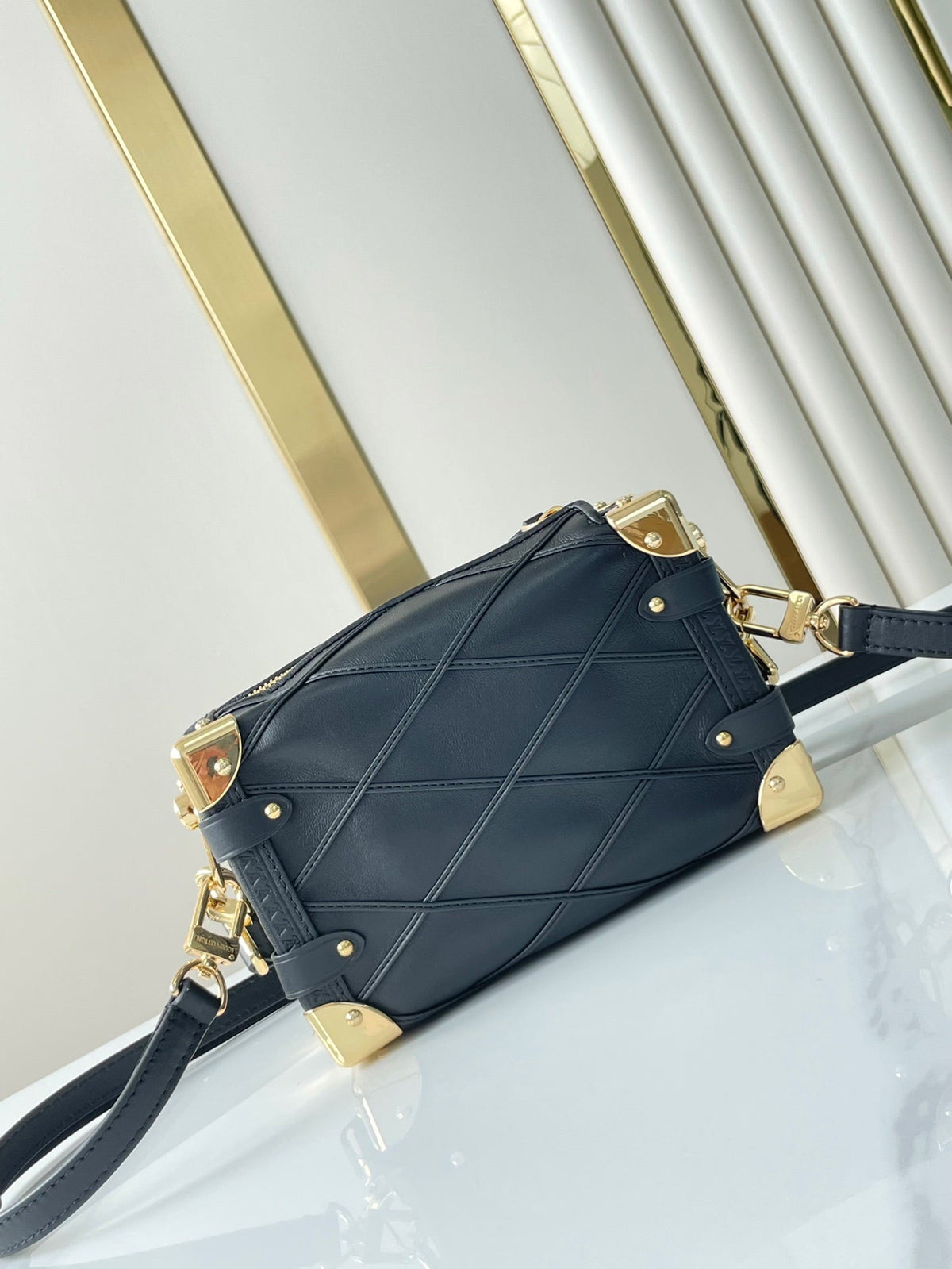 SIDE TRUNK MINI 18 IN BLACK LAMBSKIN WITH CRISS CROSS PATTERN GOLD HARDWARE