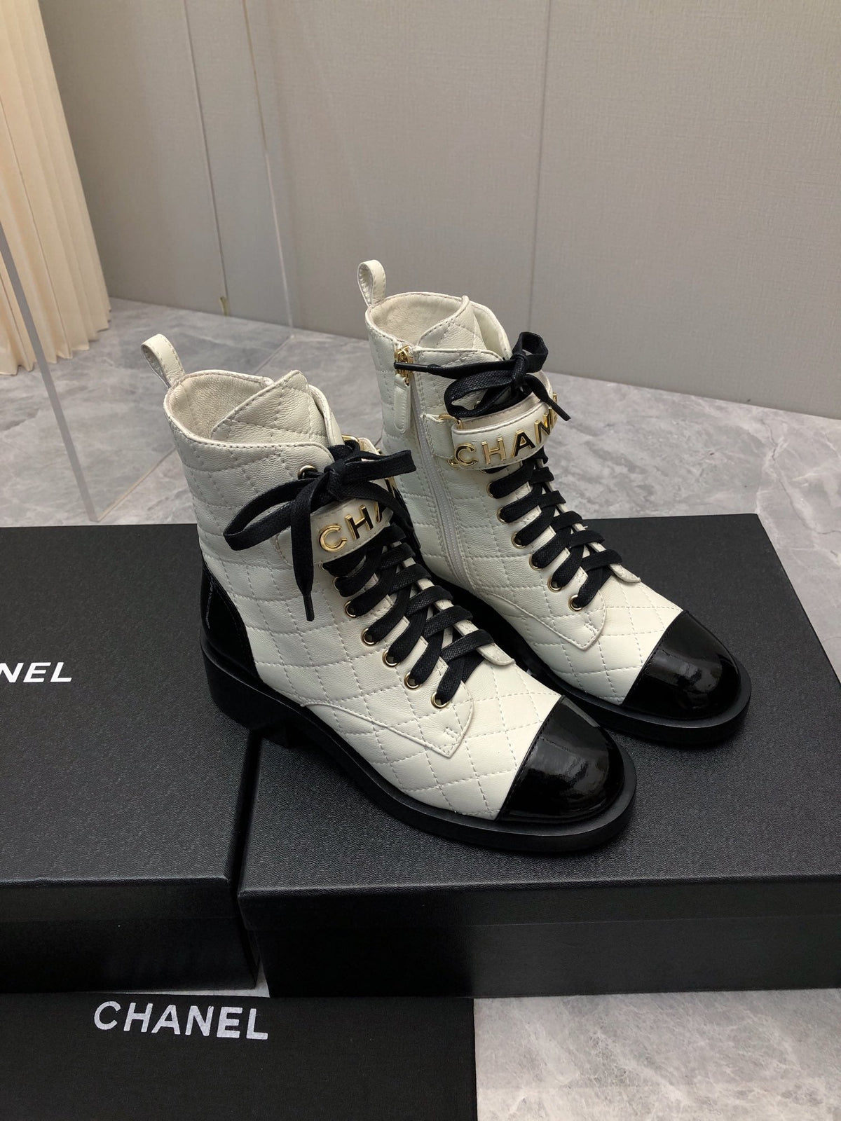 CC Short Boots 45mm In White Mix Black Quilted Lambskin And Glossy Cowhide 950036