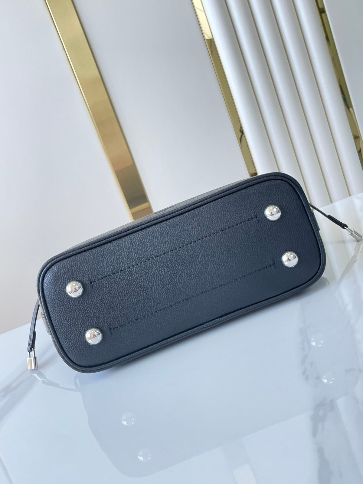 FLORE 28 IN CHARCOAL PERFORATED CALFSKIN