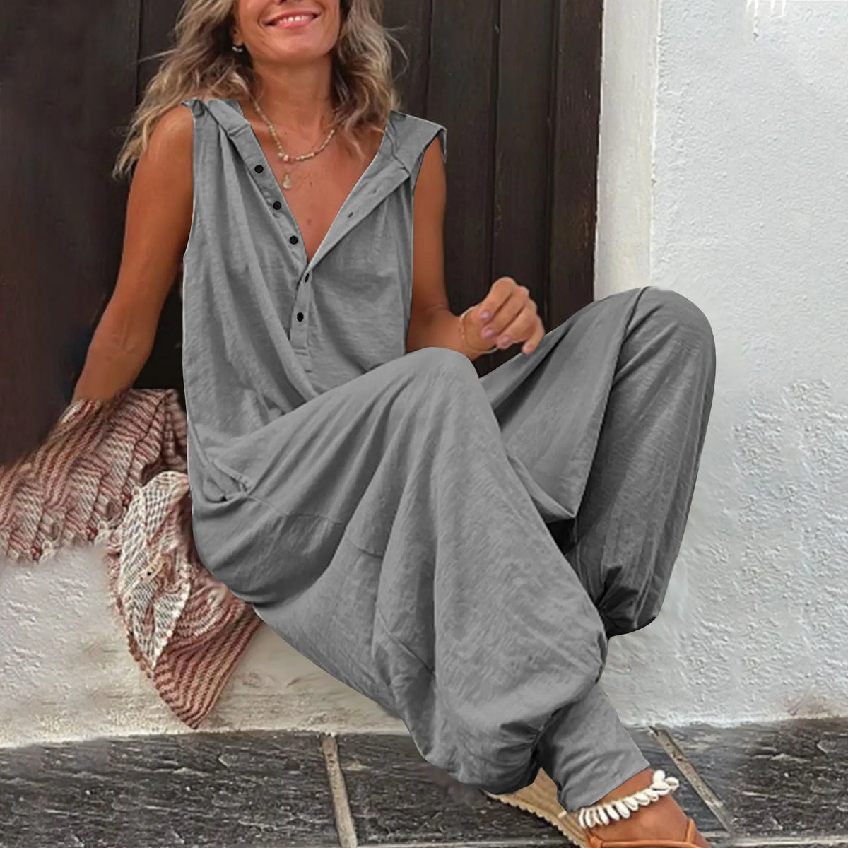 New Button Hooded Sleeveless Jumpsuit hercurva