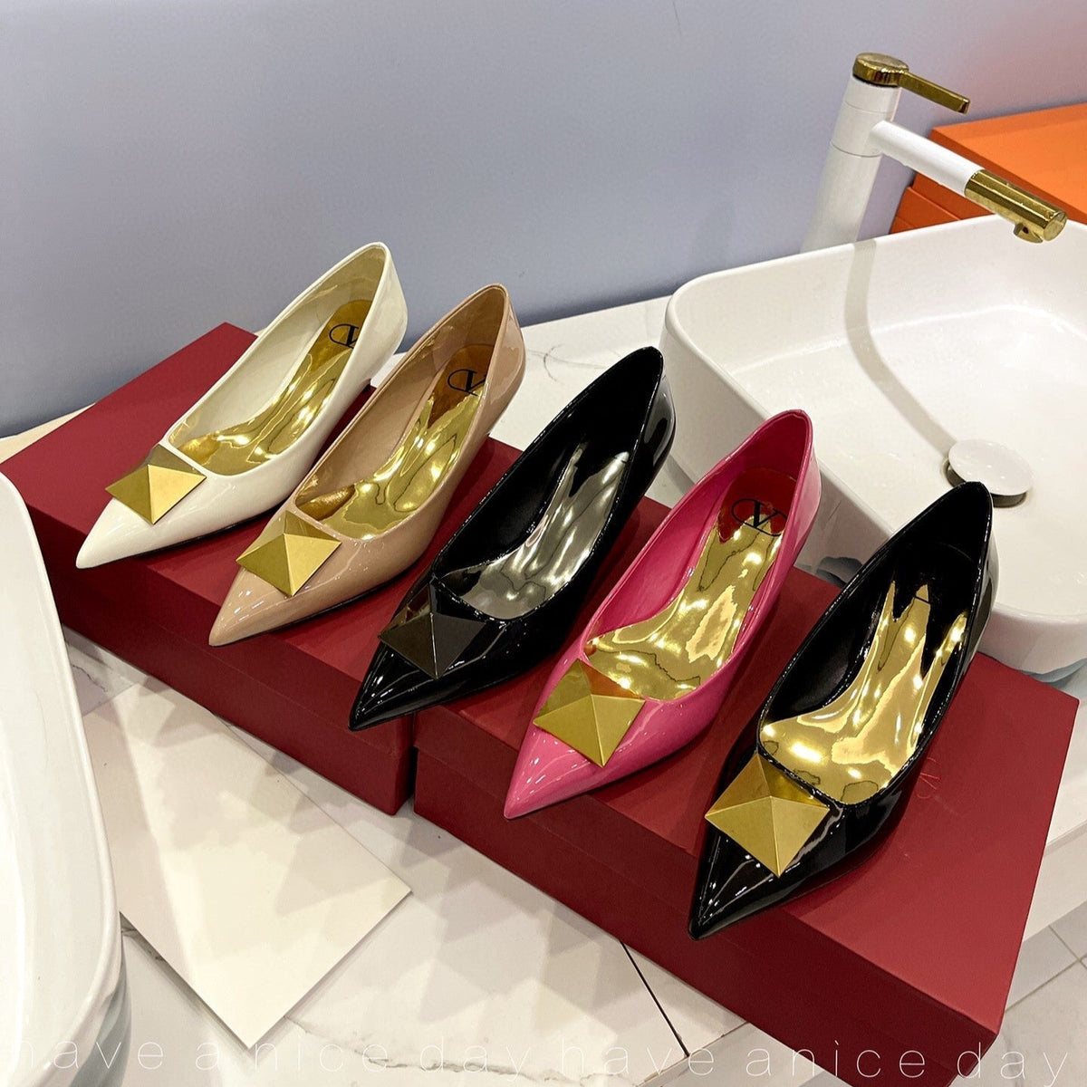 One Stud Gold Patent Black Leather Pump