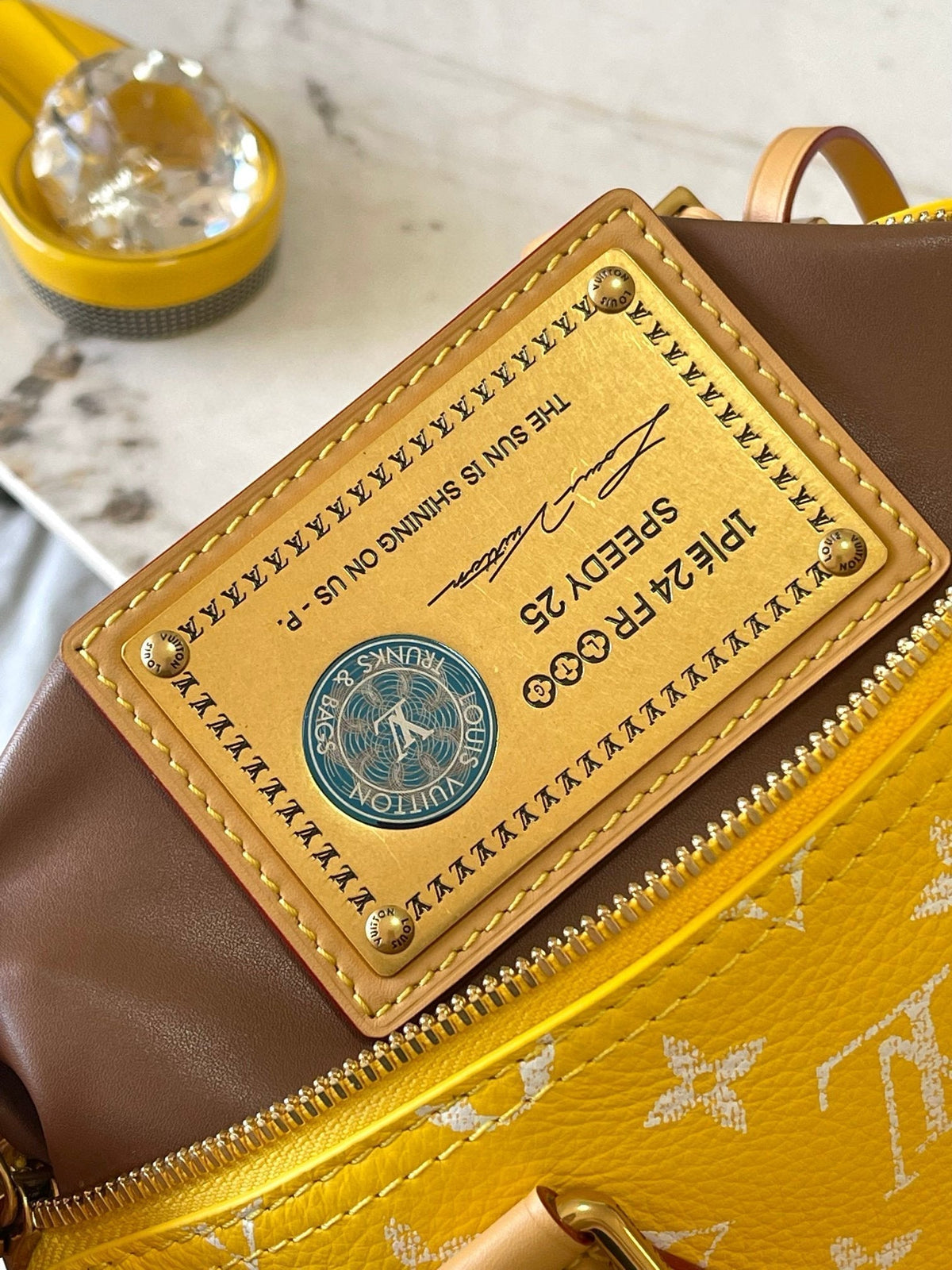 speedy p9 bandouliere 25cm yellow calfskin