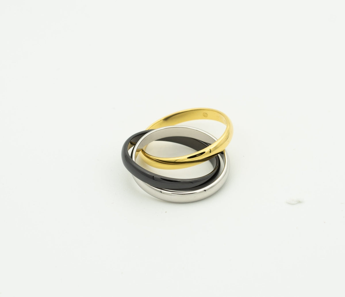 TRINITY RING BLACK GOLD SILVER