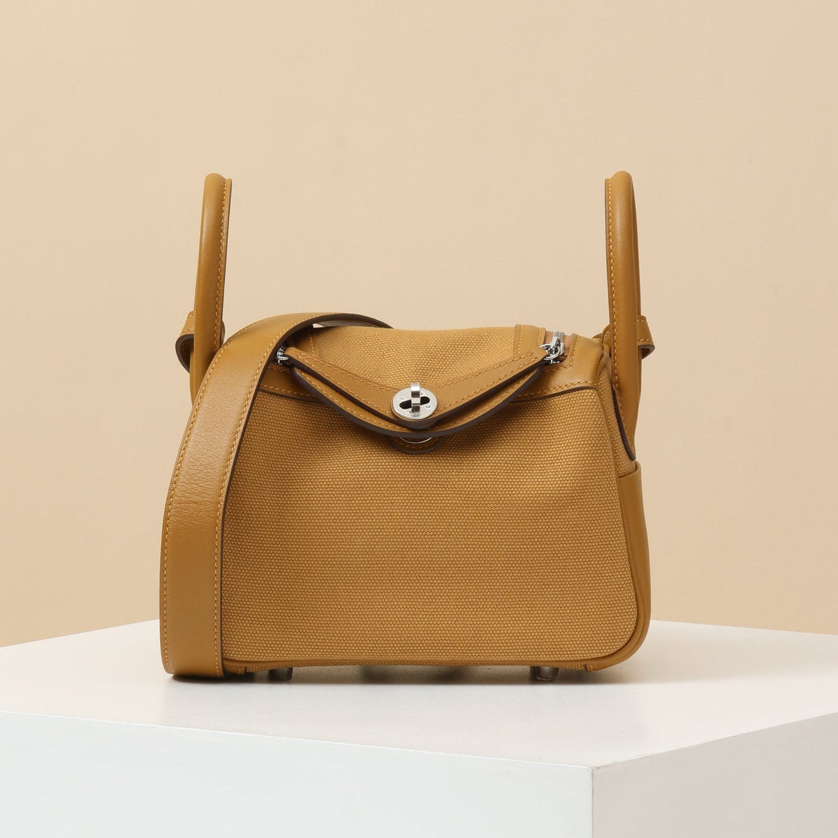 High-end Hermes 2026 Mini Lindy Cargo Bag 19cm Swift Leather Canvas