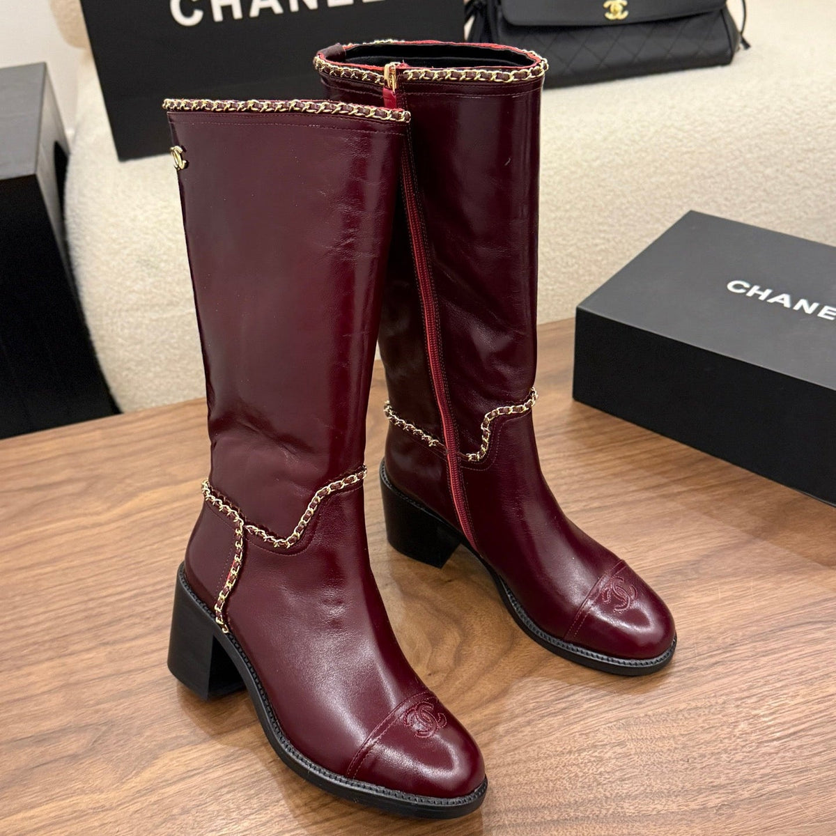 Chanel 2026 Crumped Cap Toe Chain Boots 65mm Leather 173455
