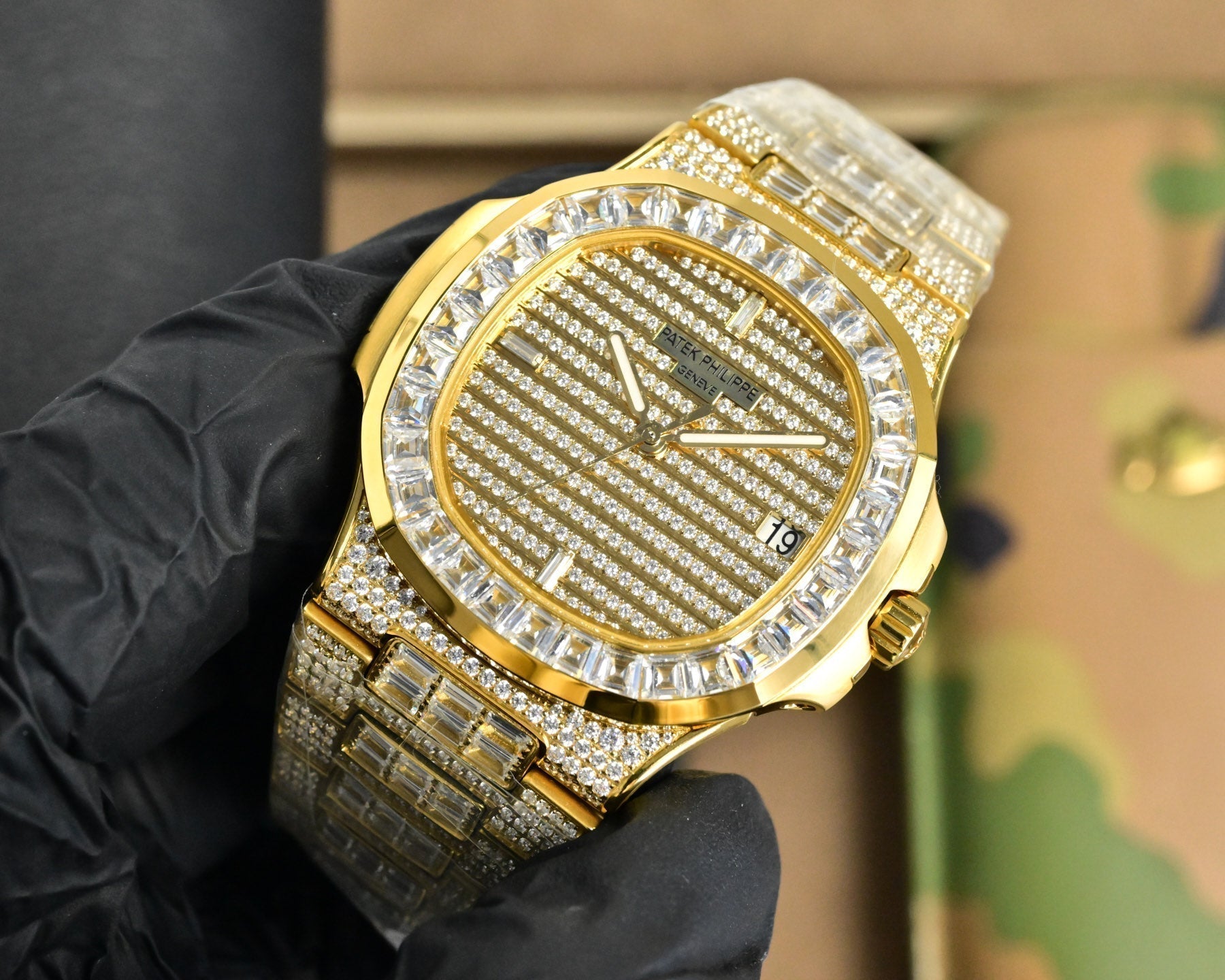 Patek Philippe Nautilus 40mm Yellow Gold Baguette Diamonds Watch