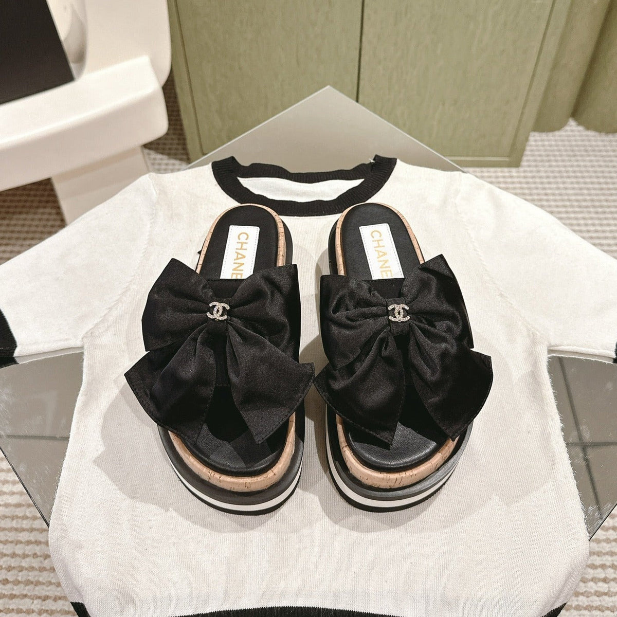 CC SLIPPERS WITH SILK BOW IN BLACK COWHIDE
