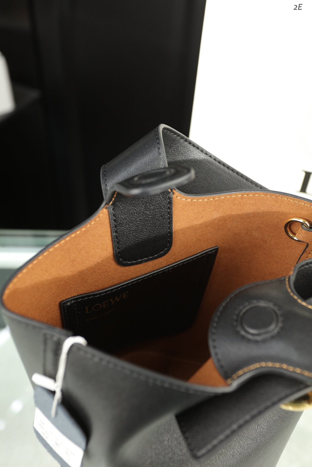 LOE MINI 19 PEBBLE BUCKET IN BLACK MELLOW CALFSKIN