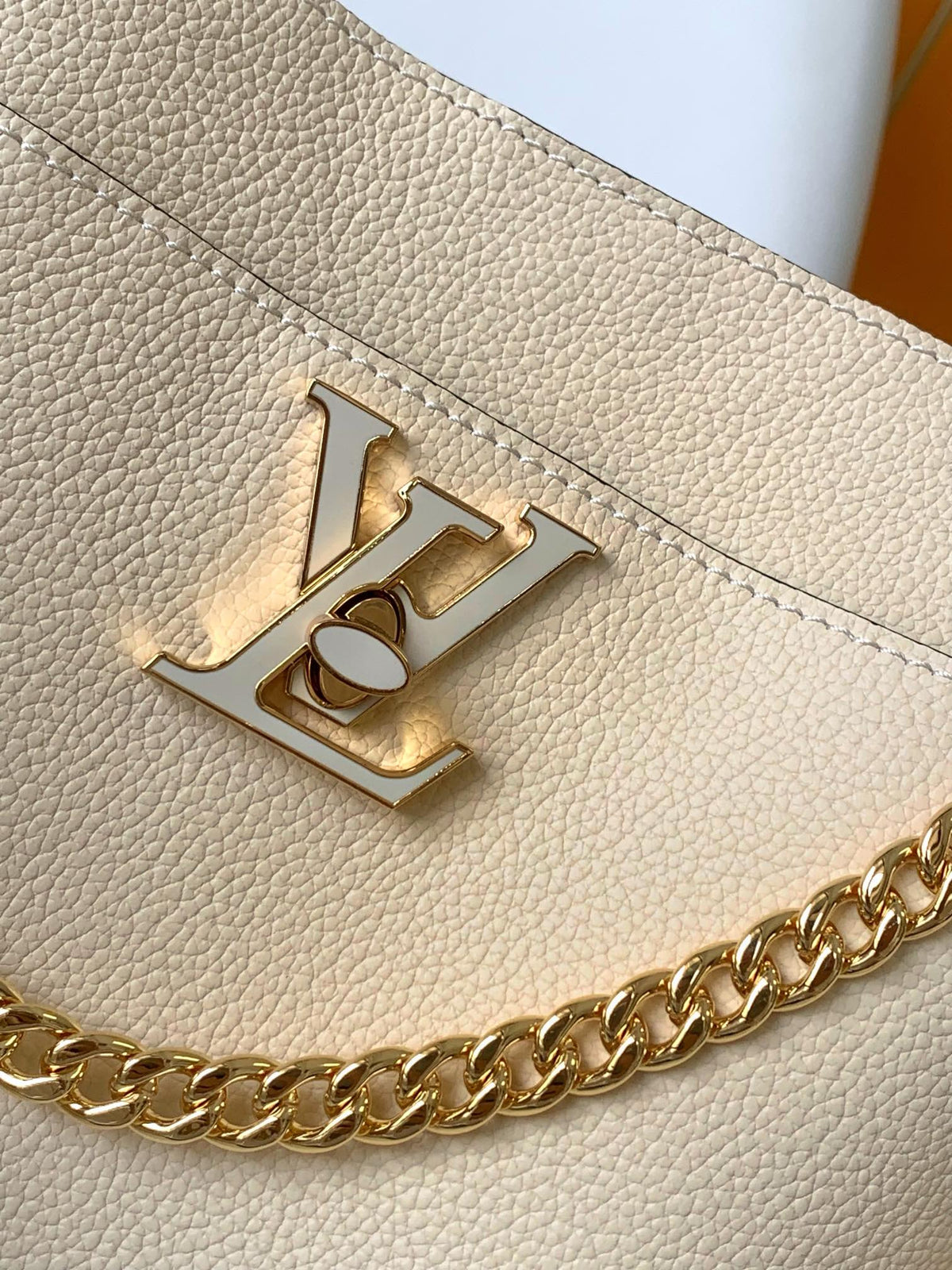 LV Lock and Walk Bag White Gold Cowhide 241224