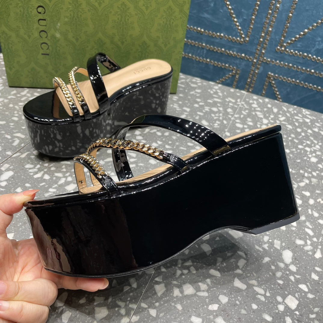 HIGH WEDGE PLATFORM IN BLACK CALFSKIN WITH GOLD HARDWARE