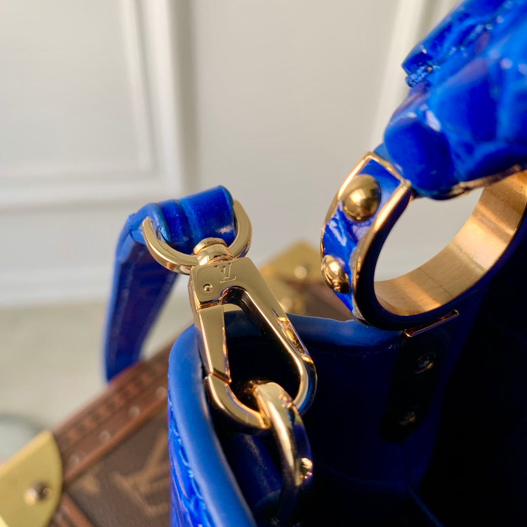 CAPUCINES MINI 21 COBALT BLUE CROCODILE EMBOSSED CALFSKIN GOLD HARDWARE