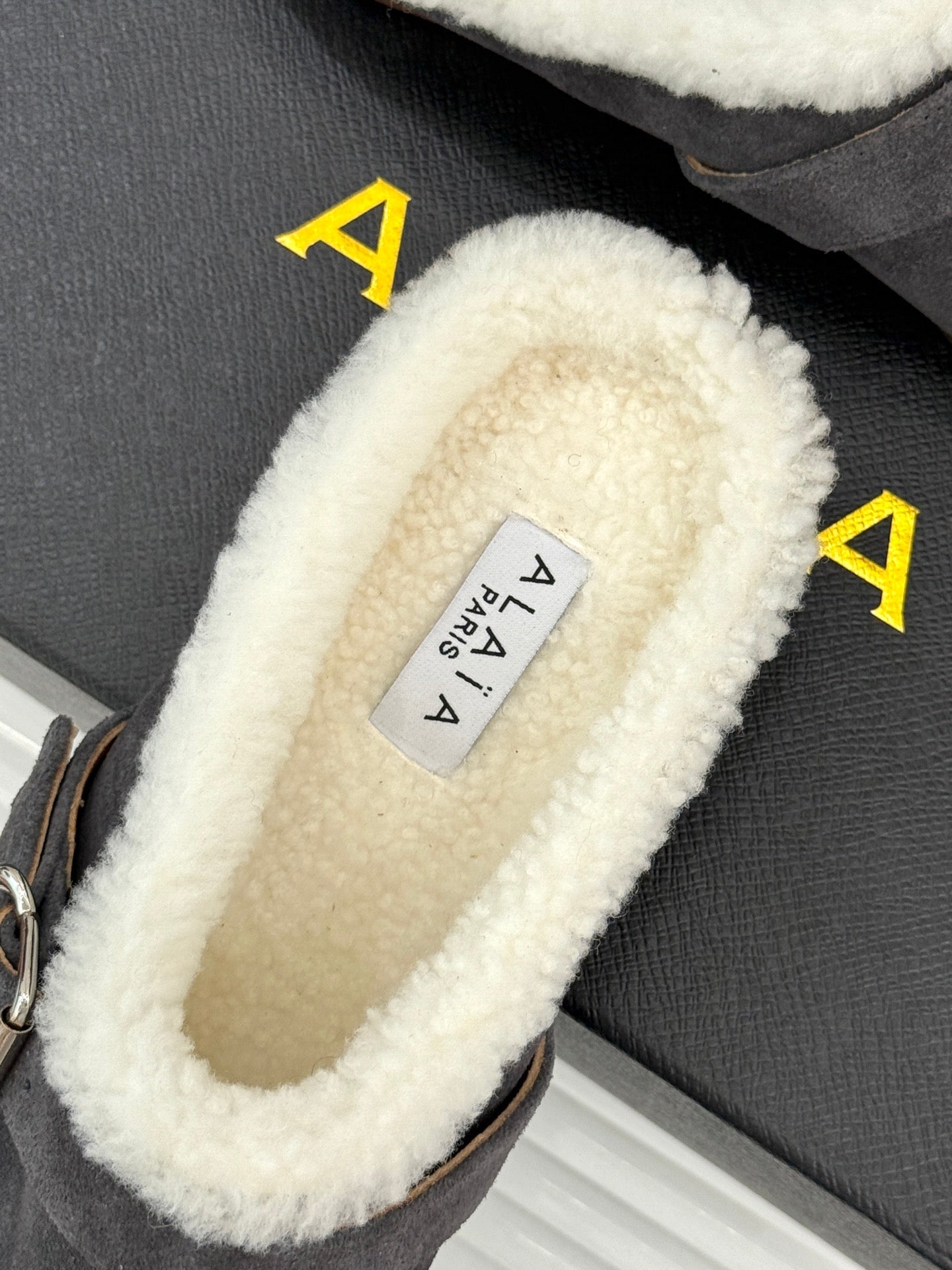 Alaia 25WF slippers belt buckle charcoal grey suede wool 472230