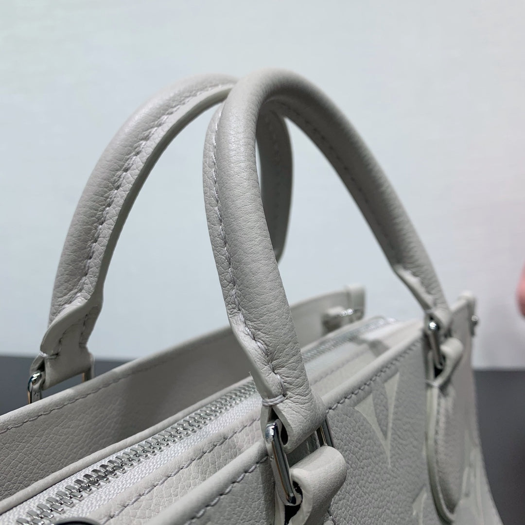 LV OnTheGo East West Gray Monogram Empreinte Leather 205497