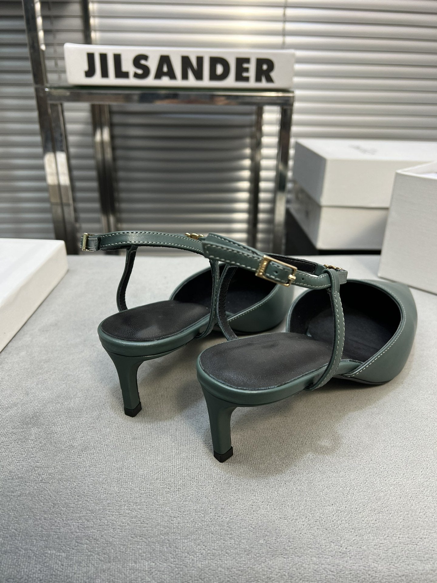 cl kitten 50 blue green calfskin
