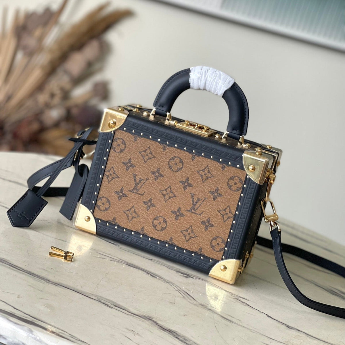 PETITE VALISE 22 IN BROWN MONOGRAM REVERSE CANVAS AND BLACK CALFSKIN TRIM GOLD HARDWARE