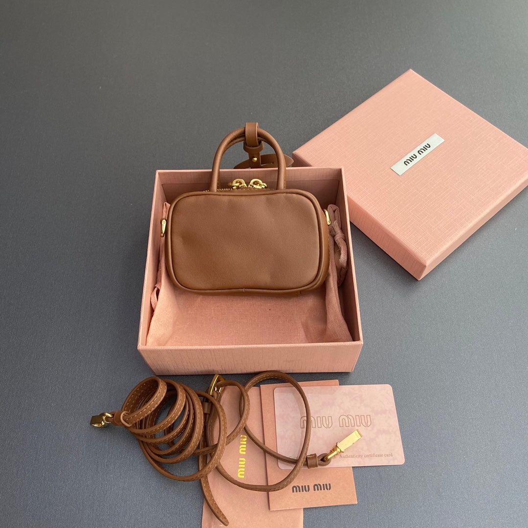 MICRO BAG KEYCHAIN 11 IN CAPE PALLISER BROWN CALFSKIN EMBOSSED LOGO
