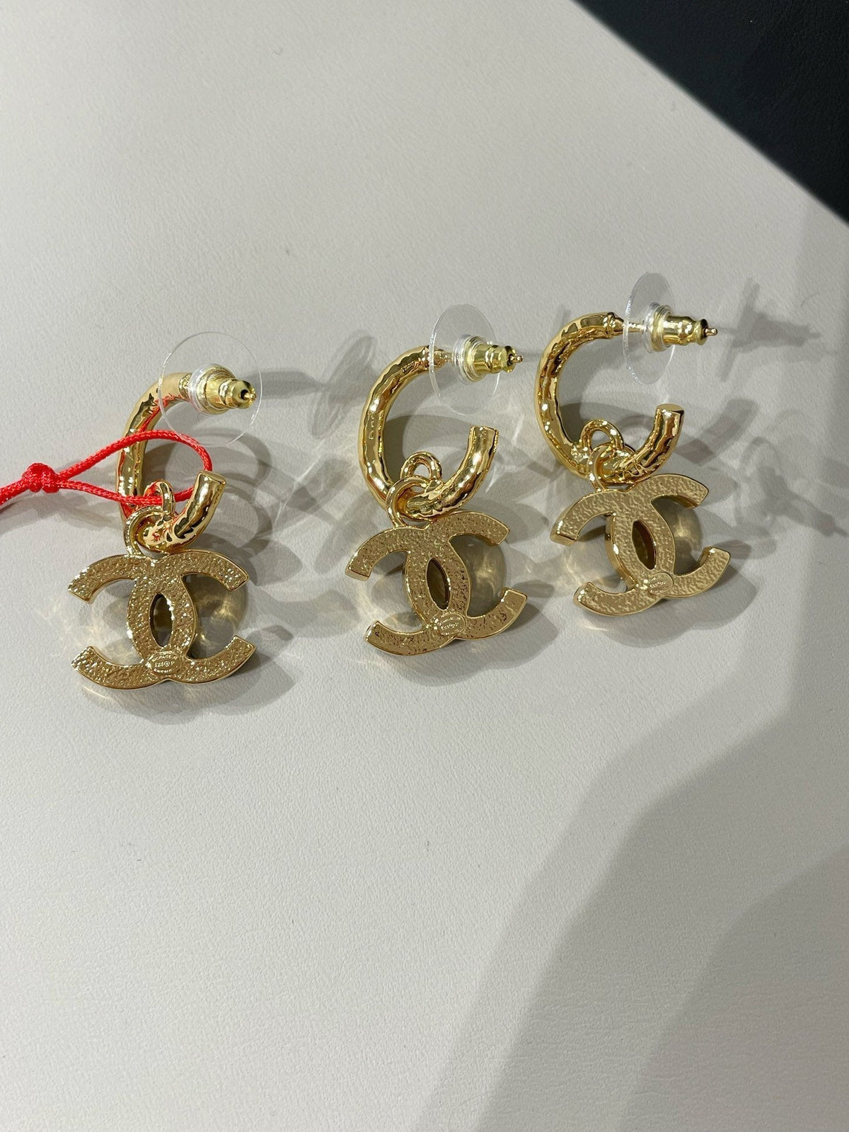cc logo heart earrings