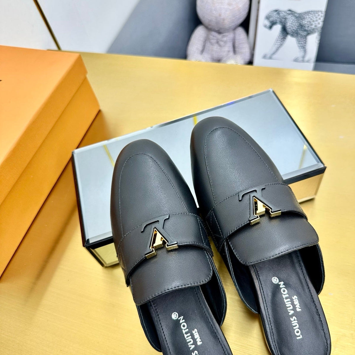 LV 25C LV Capri Open Back Loafer Black Cowhide 219928